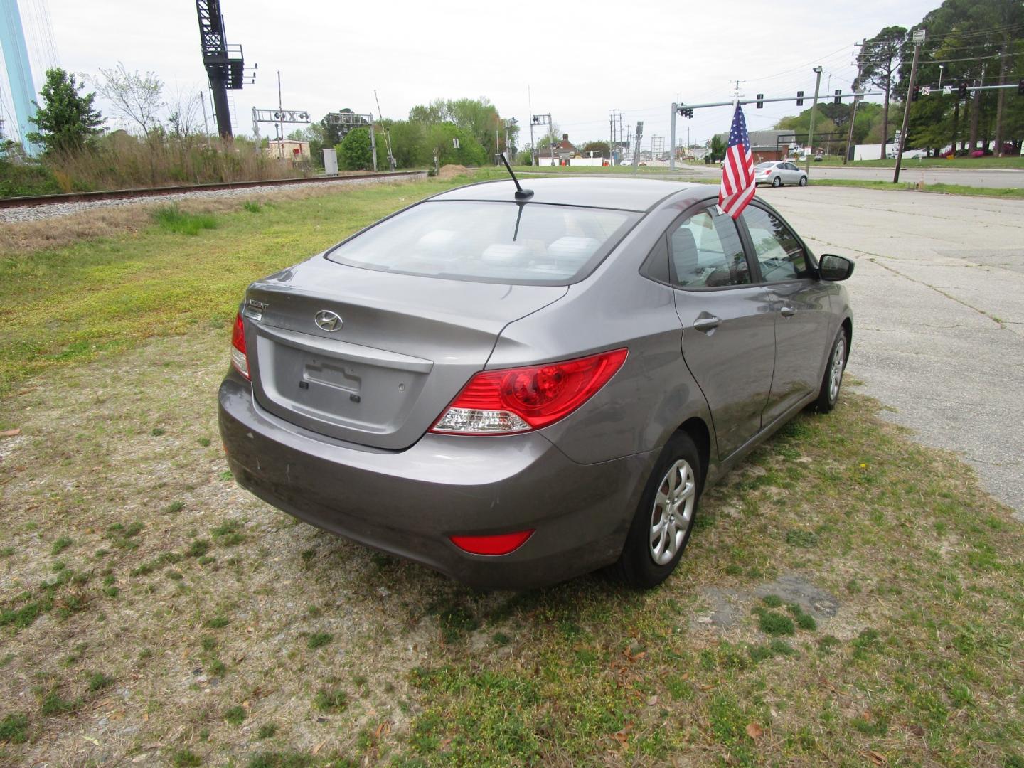 2014 Gray Hyundai Accent GLS 4-Door (KMHCT4AE9EU) with an 1.6L L4 DOHC 16V engine, Automatic transmission, located at 2553 Airline Blvd, Portsmouth, VA, 23701, (757) 488-8331, 36.813889, -76.357597 - ***VEHICLE TERMS*** Down Payment: $999 Weekly Payment: $75 APR: 23.9% Repayment Terms: 42 Months *** CALL ELIZABETH SMITH - DIRECTOR OF MARKETING @ 757-488-8331 TO SCHEDULE YOUR APPOINTMENT TODAY AND GET PRE-APPROVED RIGHT OVER THE PHONE*** - Photo#5